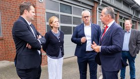 Christan Fühner, Karin Prien, Markus Lohle und Andreas Nünemann